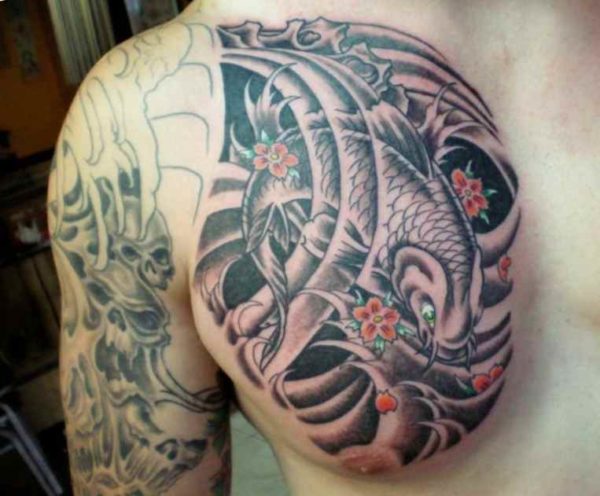 Koi fish tattoo chest and arm
