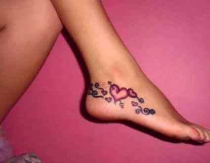 Feminine tattoos designs on foot