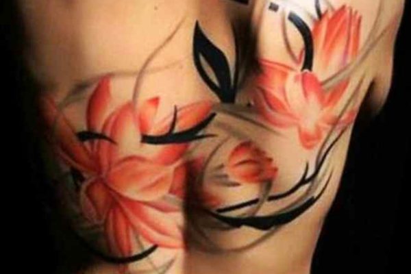 Lotus flower girls back tattoo