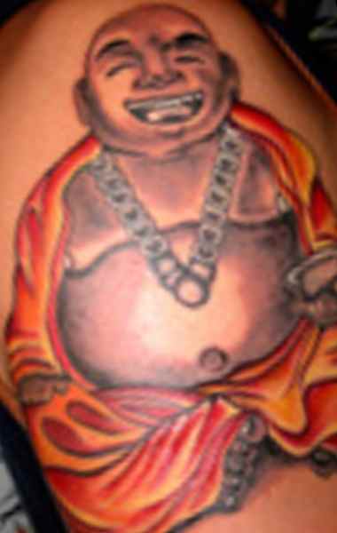 Smiling Buddha tattoo meaning